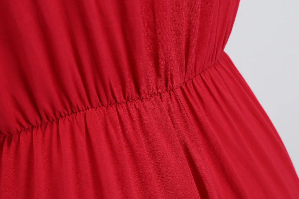 Macacão feminino sexy, com costas abertas, decote em V profundo e cordão ajustável.